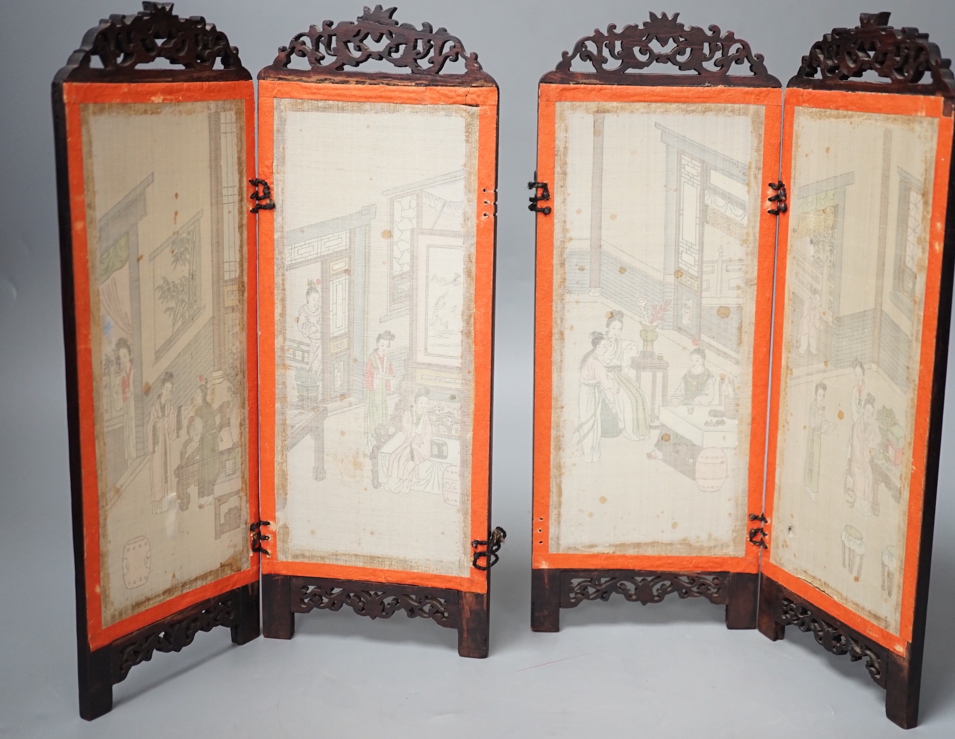 A Chinese hardwood framed painted silk four fold miniature screen, inset with painted silk panels, 28cm